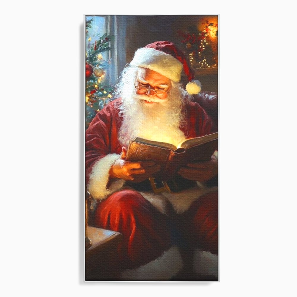Tablou canvas cu tablou canvas cu mos craciun citind, in rama de aluminiu argintiu